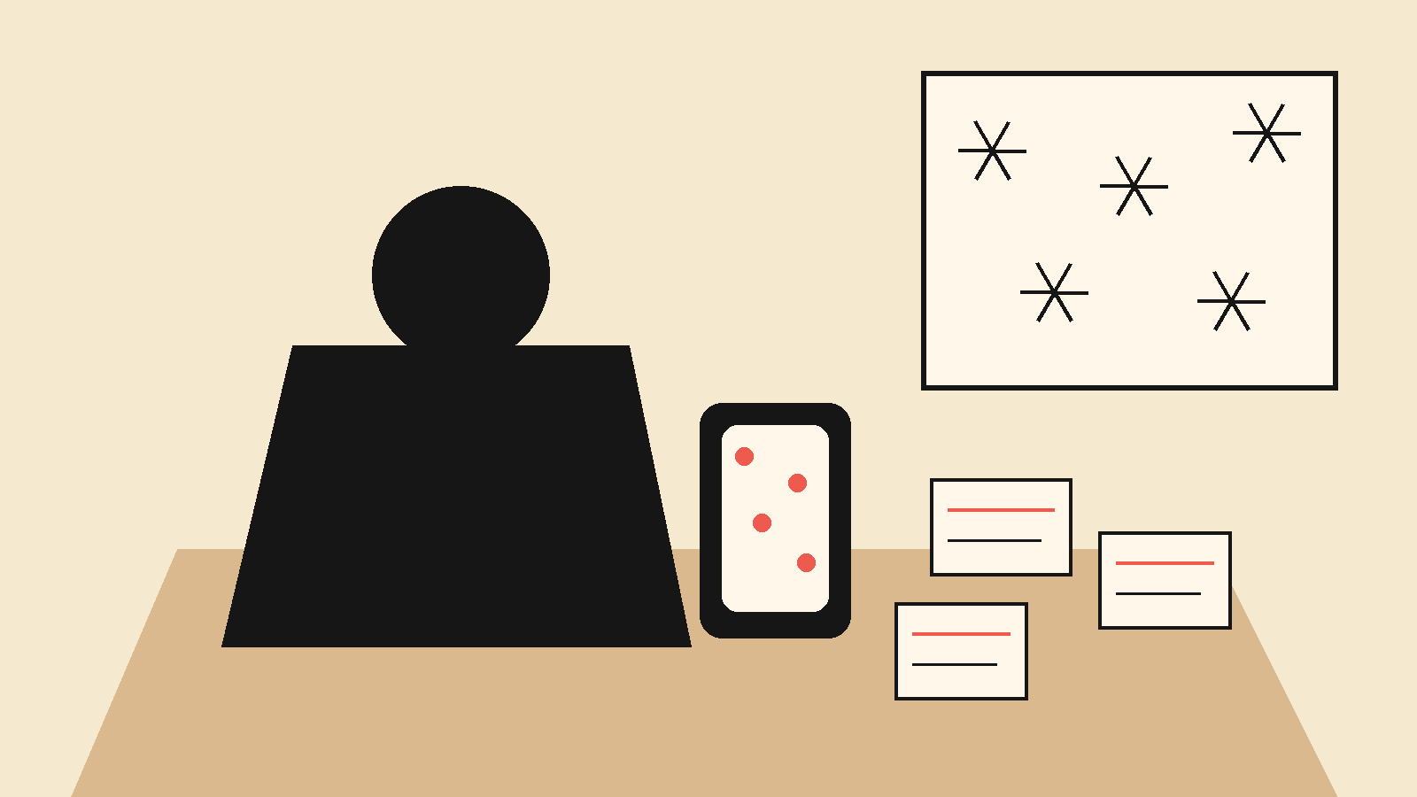 Busy desk during a cold snap with a phone full of alerts and a pile of notes